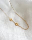 Initialen ketting 2 bedels geelgoud verguld uitgefreesde letters gftd. jewelry